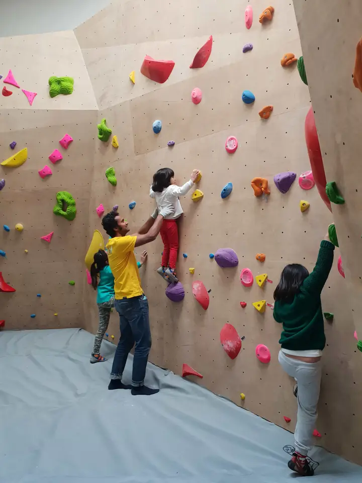 Rahul teaching some kids to climb.