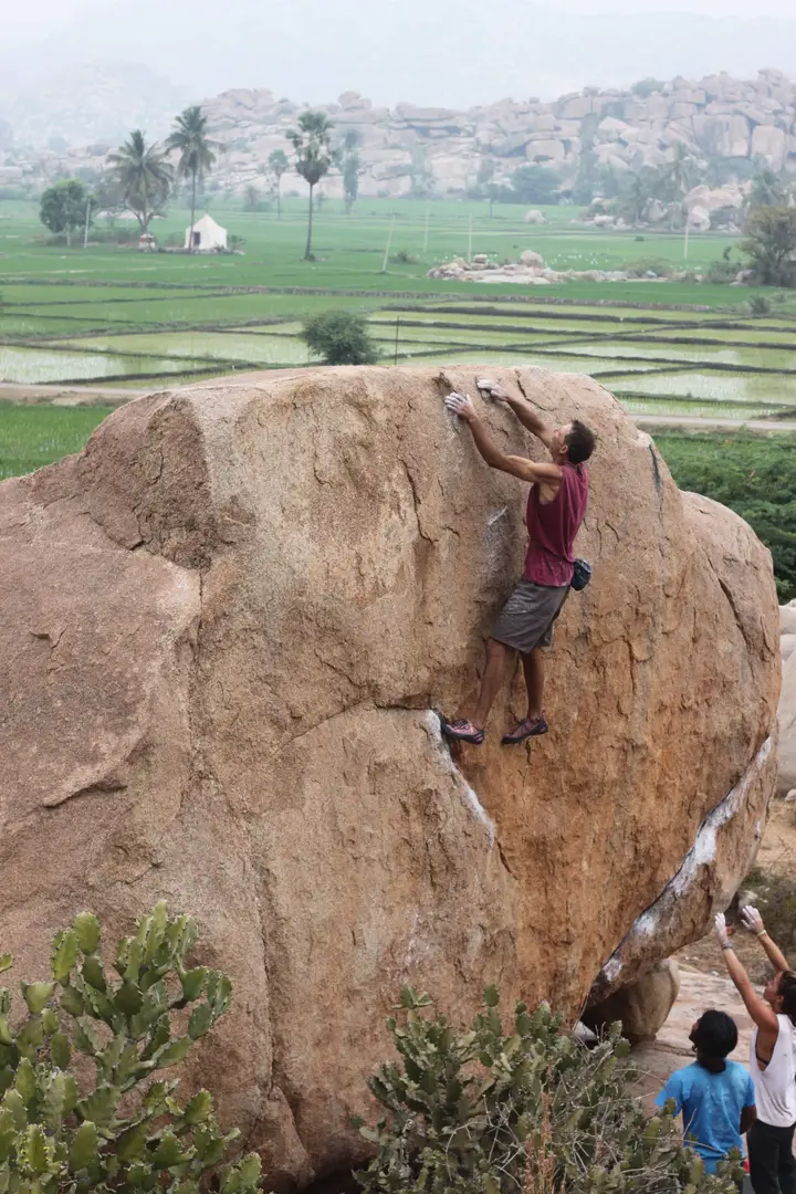 Hari climbing at the White Balls area (Chikrampur), called so for the concentration of whitish-grey rounded boulders, differing from Hampi's more common, sharp, brown-orange granite.