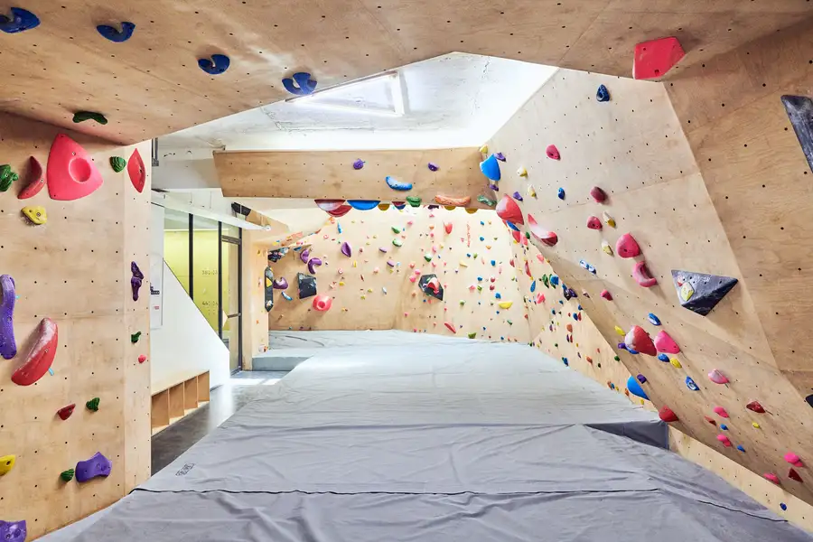 Climbers training on the wall at BoulderBox